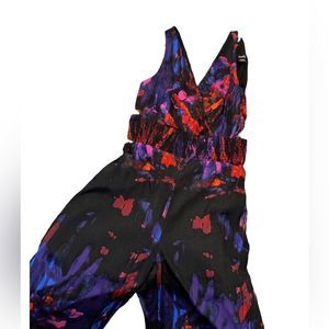 🎉Hosts pick🎉 NWT bebe Floral Printed Smocked Detail Jumpsuit size 10